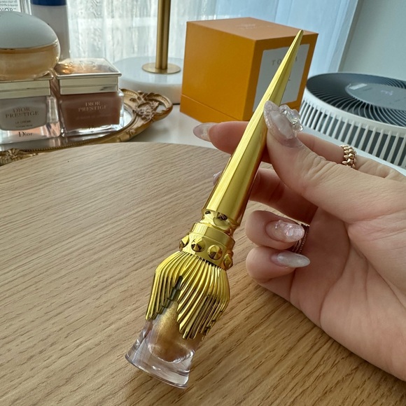 Christian Louboutin Other - Gold metallic eye makeup by Christian Louboutin